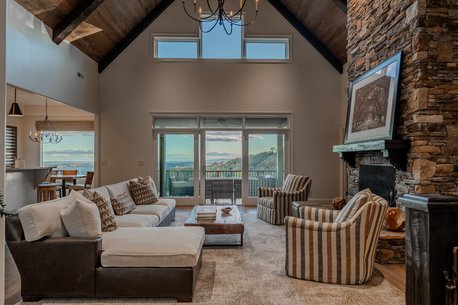 Great room with stacked-stone fireplace