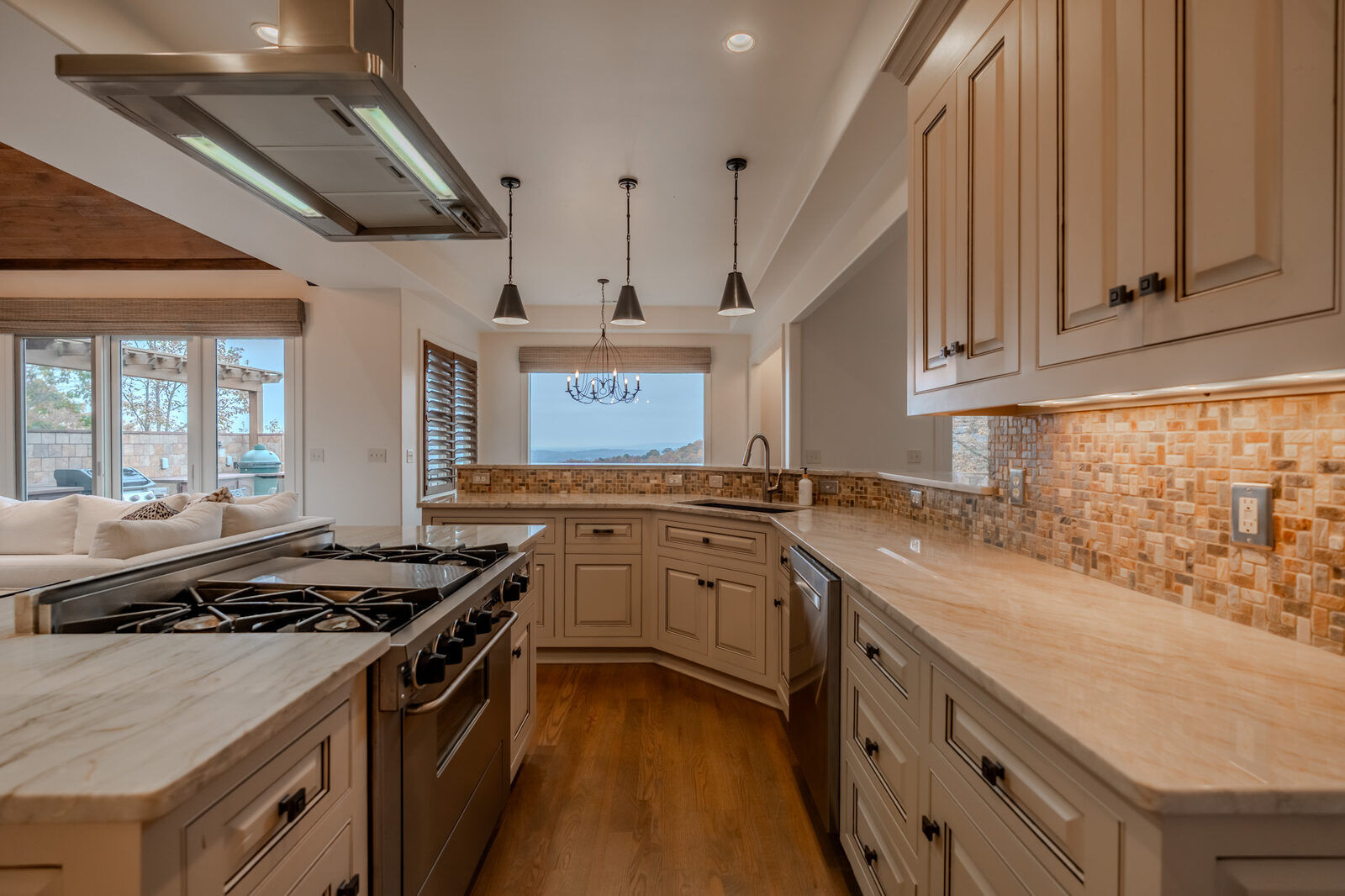 Chef's kitchen with island and gas range